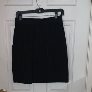 Excellent condition Lida Baday mini skirt with elastic band and back zipper